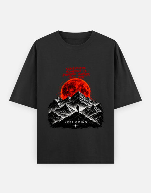 Artelvio KEEP GOING oversized t-shirt with red moon and mountain graphic