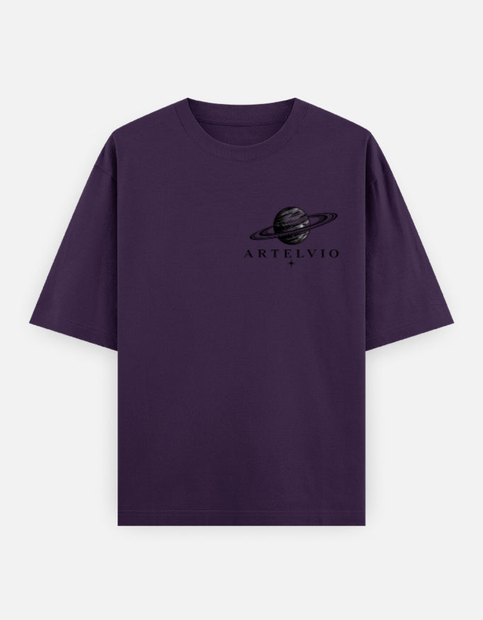 Purple oversized t-shirt featuring the ARTELVIO ringed planet graphic on the chest