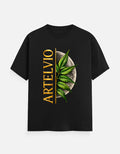ARTELVIO Lunar Botanica Tee in black with green botanical leaves, full moon graphic, and vertical ARTELVIO typography
