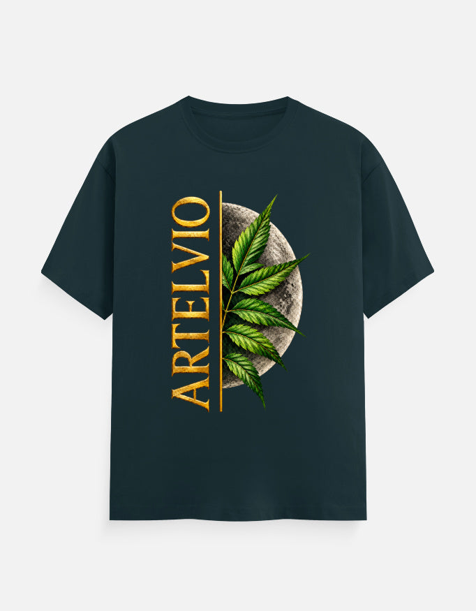 ARTELVIO Lunar Botanica Tee in petrol blue with green botanical leaves, full moon graphic, and vertical ARTELVIO typography