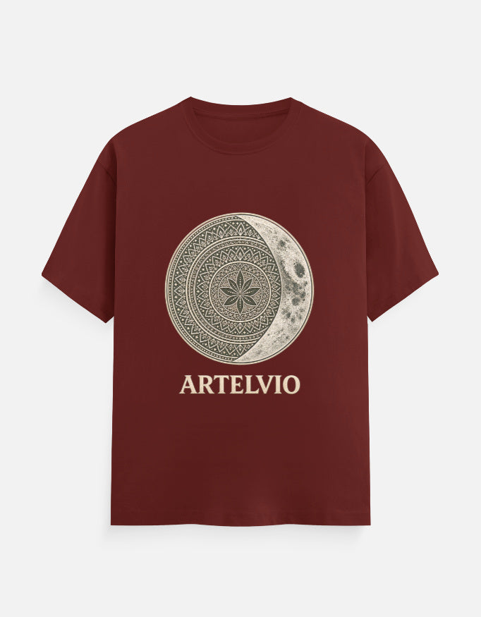 ARTELVIO Celestial Mandala Tee in brick red with a celestial mandala sun and crescent moon graphic on the front