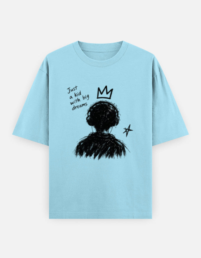 Light blue oversized t-shirt with a hand-drawn kid with big dreams graphic, crown and star on the front