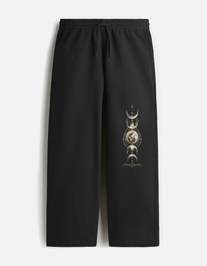 ARTELVIO COSMIC CONNECTION black oversized sweatpants with vertical moon phase graphic