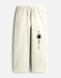ARTELVIO GOOD ENERGY ONLY oversized sweatpants with vertical celestial graphic on the leg