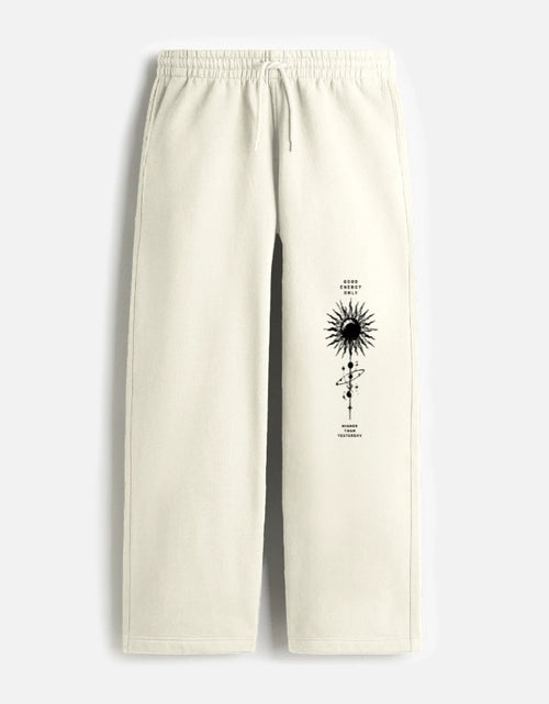 ARTELVIO GOOD ENERGY ONLY oversized sweatpants with vertical celestial graphic on the leg